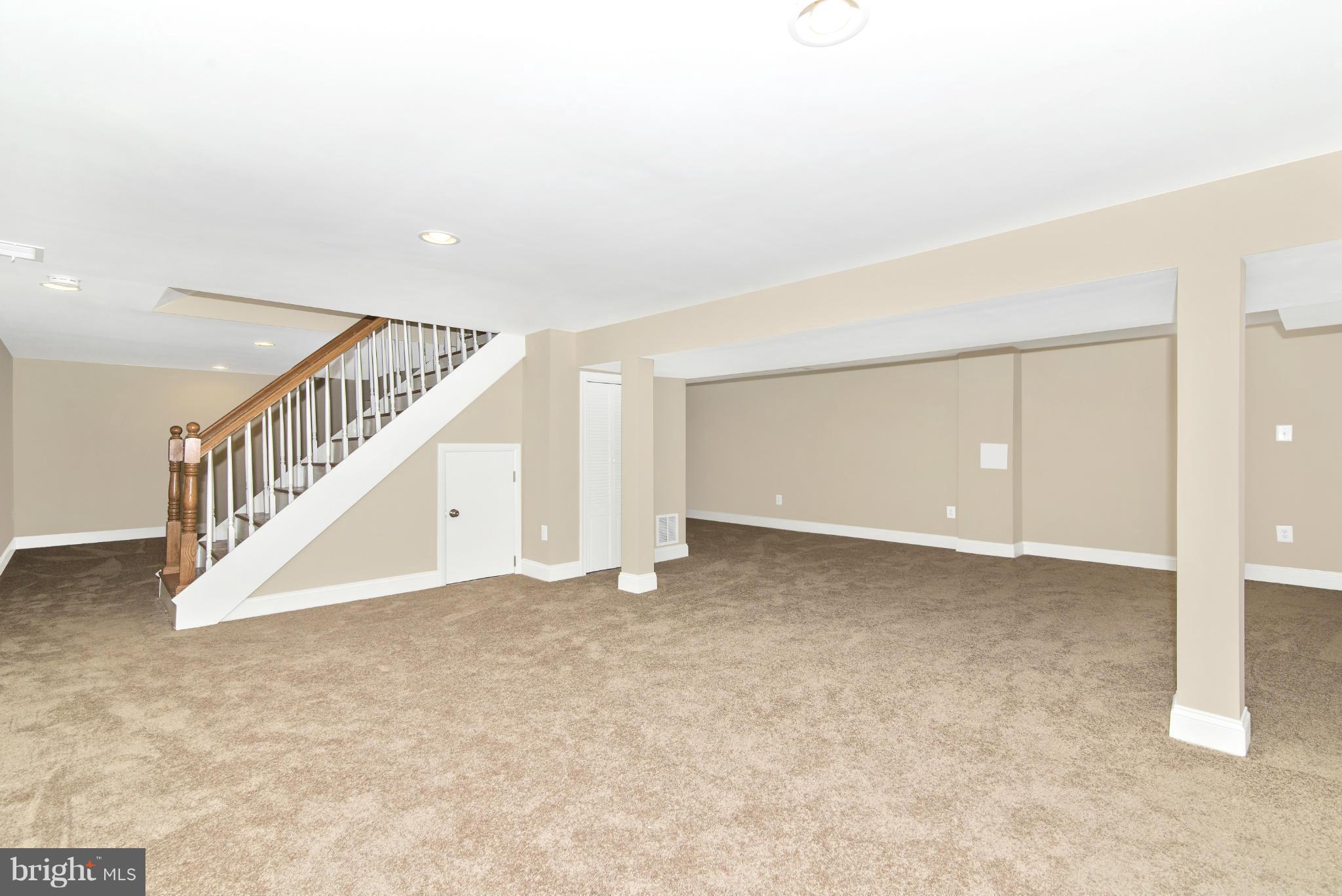 18126 Beallsville Road Poolesville, MD 20837 - Photo 20 of 21 a view of an empty room with stairs