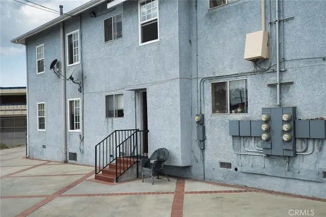 a view of a house with a patio
