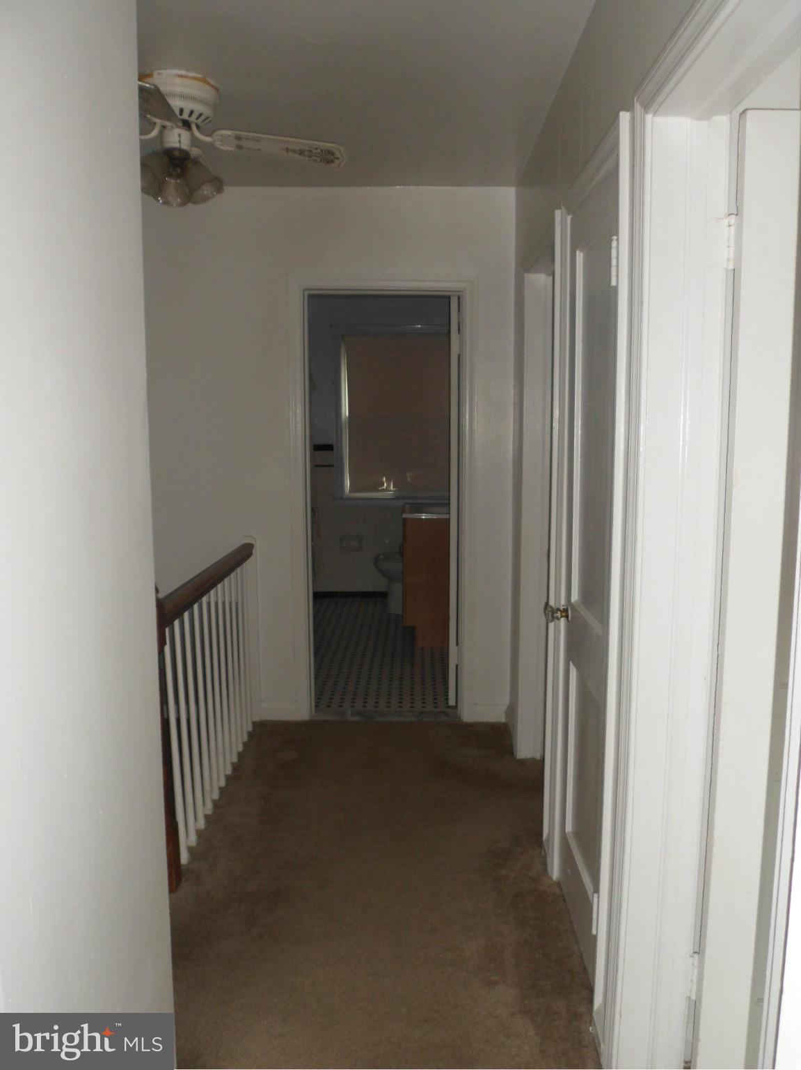 1333 Stonewood Road Baltimore, MD 21239 - Photo 21 of 30 a view of a hallway