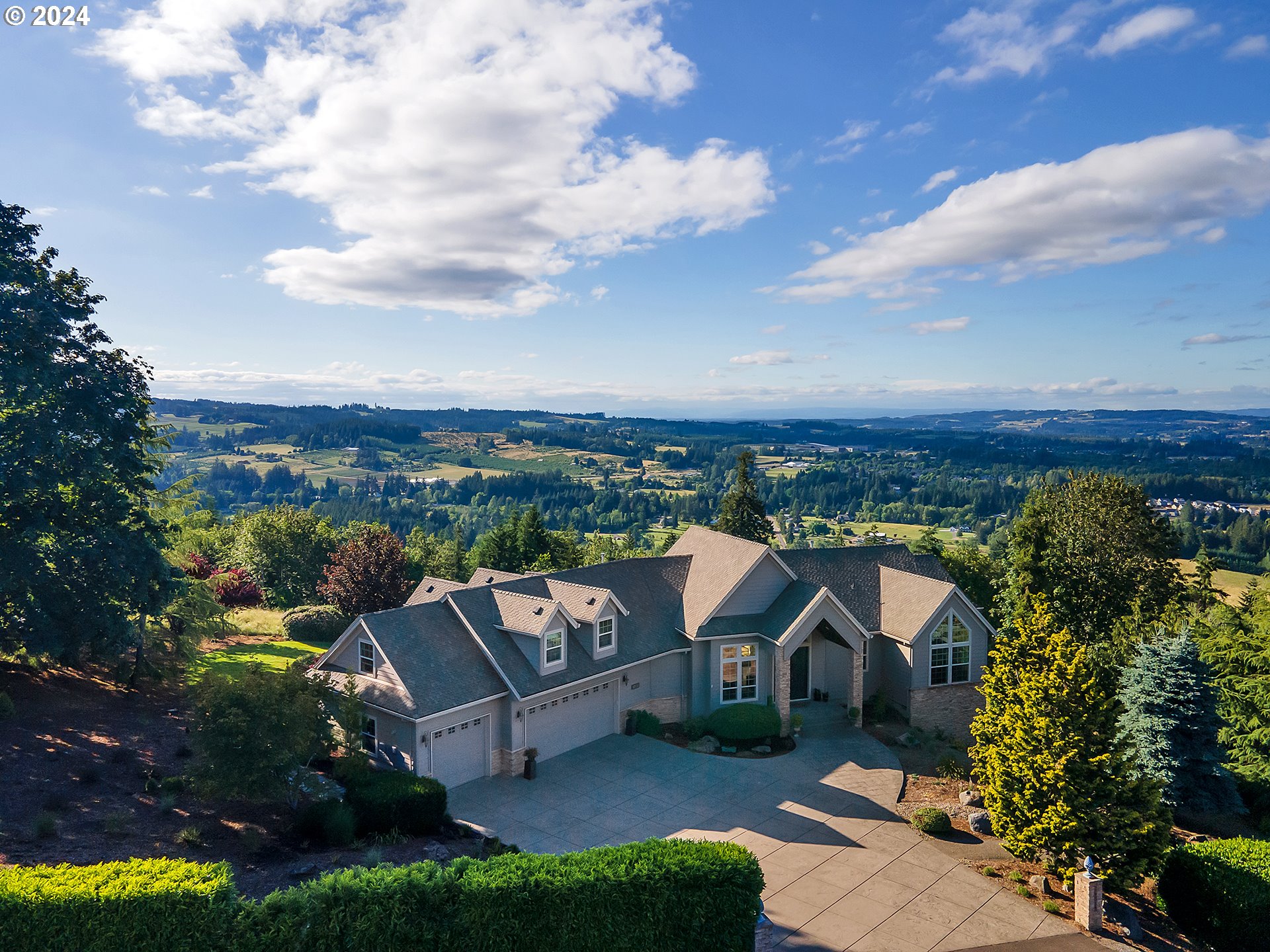 26317 Southwest Labrousse Road Sherwood, OR 97140 - Photo 1 of 38 an aerial view of a house with a yard table and chairs