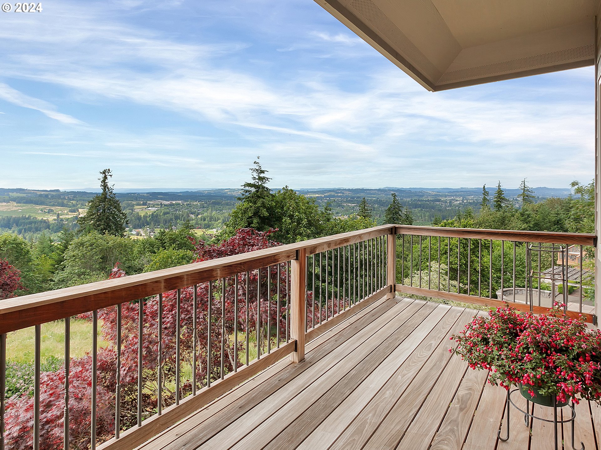 26317 Southwest Labrousse Road Sherwood, OR 97140 - Photo 18 of 38 a view of a balcony with wooden floor next to a yard