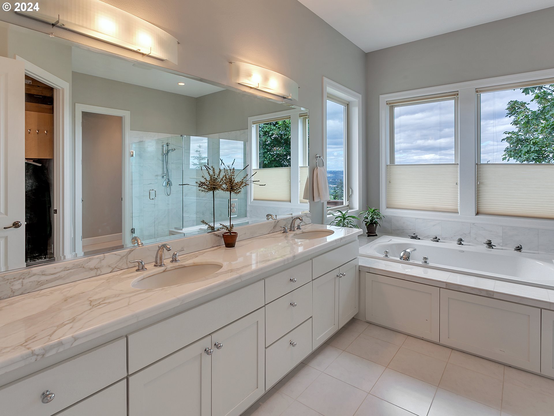 26317 Southwest Labrousse Road Sherwood, OR 97140 - Photo 20 of 38 a bathroom with a double vanity sink window and mirror