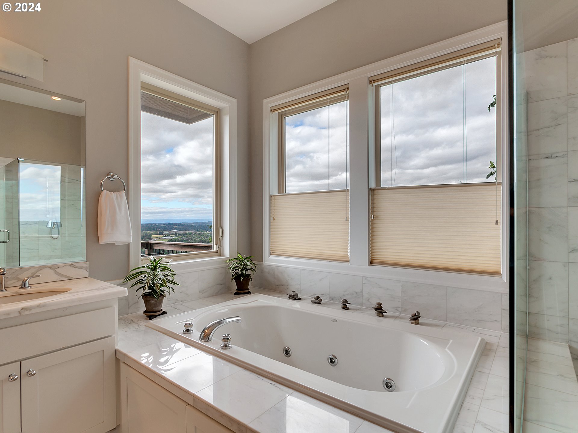 26317 Southwest Labrousse Road Sherwood, OR 97140 - Photo 21 of 38 a bathroom with a tub sink and mirror
