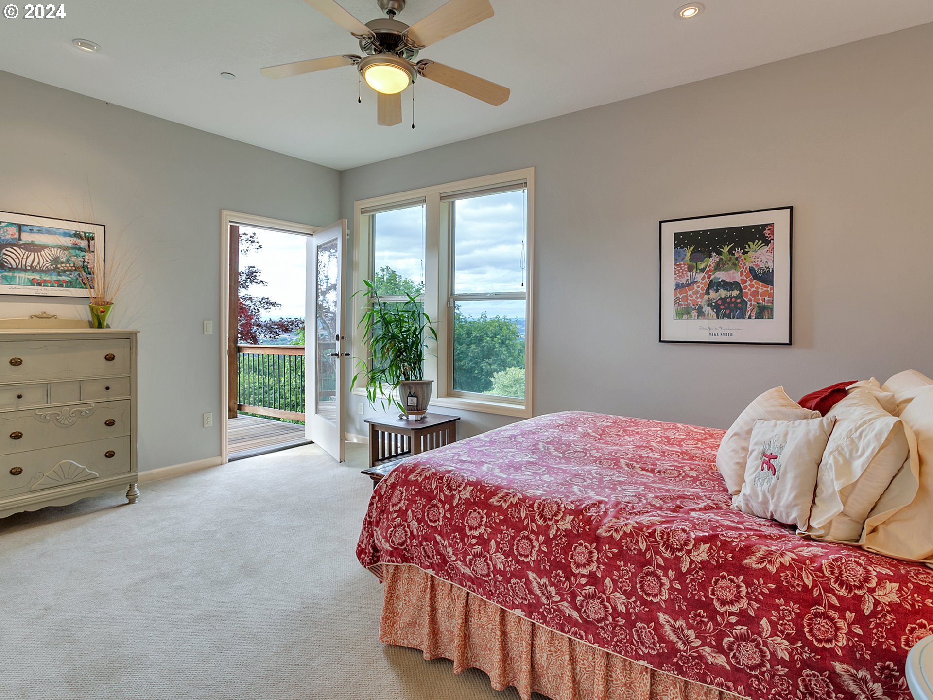 26317 Southwest Labrousse Road Sherwood, OR 97140 - Photo 27 of 38 a bed sitting in a bedroom next to a window