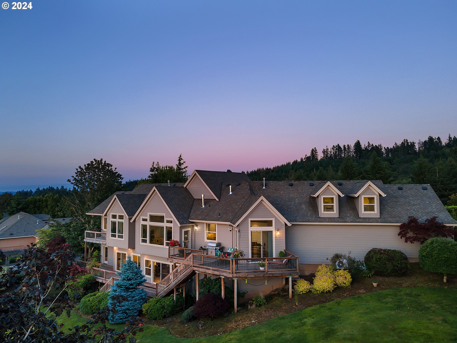 26317 Southwest Labrousse Road Sherwood, OR 97140 - Photo 3 of 38 a front view of a house with a garden and plants