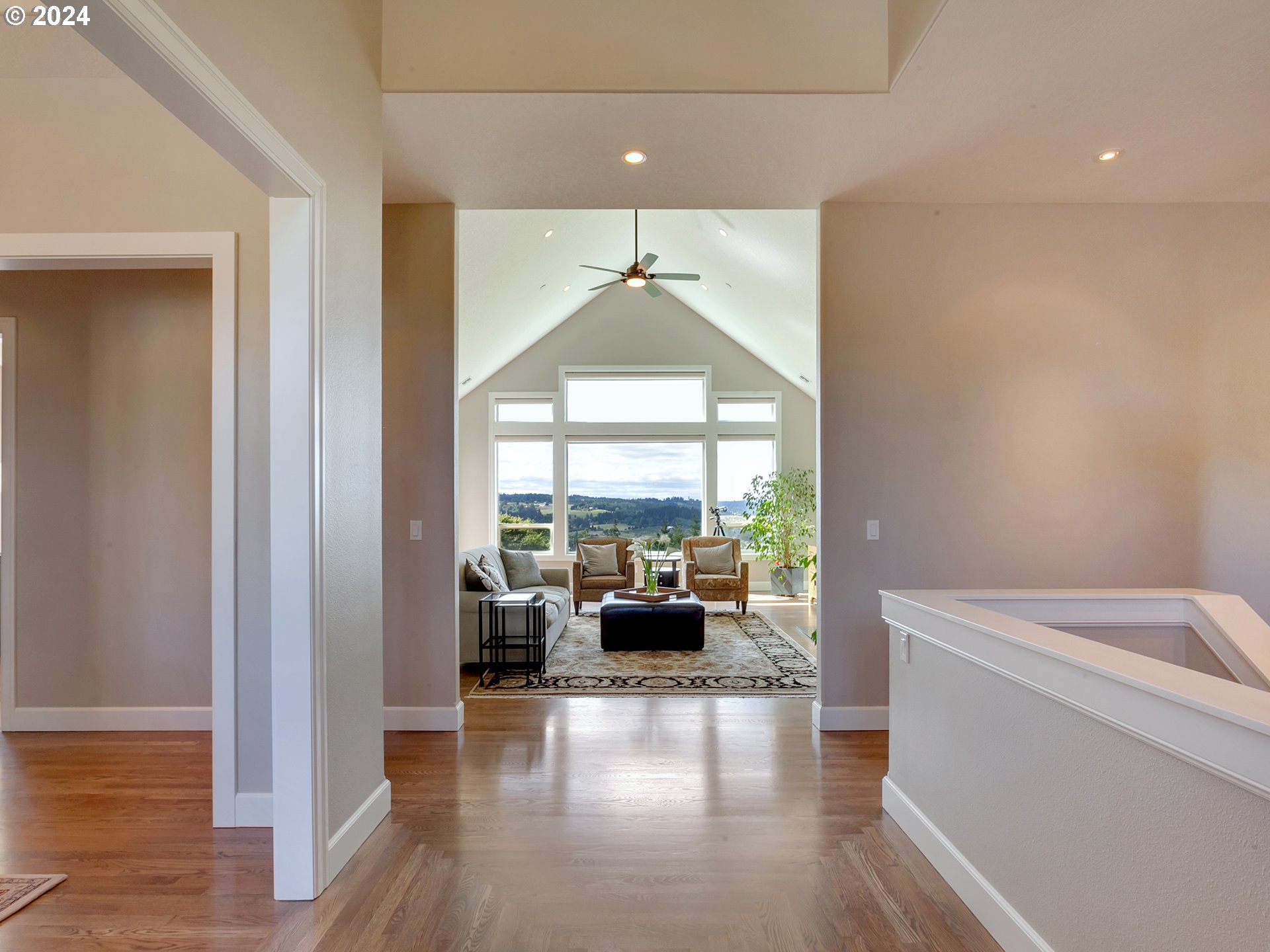 26317 Southwest Labrousse Road Sherwood, OR 97140 - Photo 5 of 38 a hallway with a couch and a large window