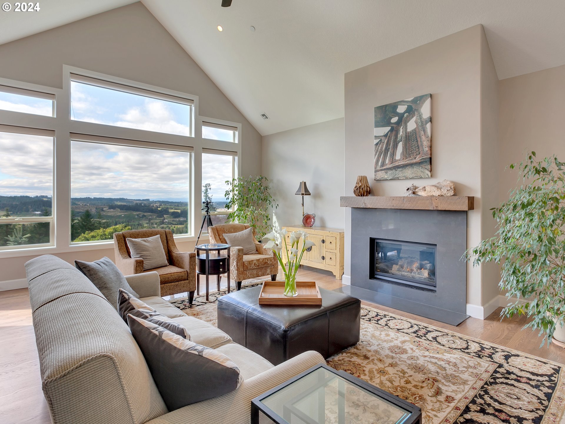 26317 Southwest Labrousse Road Sherwood, OR 97140 - Photo 6 of 38 a living room with furniture large window and a fireplace