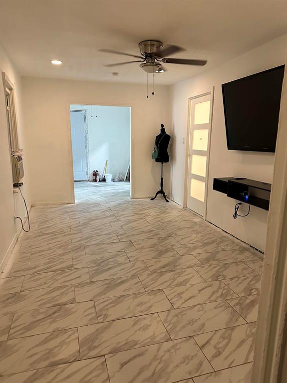 Pinewood Miami, FL 33150 - Photo 13 of 15 a view of a livingroom with a flat screen tv