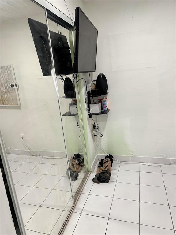 Pinewood Miami, FL 33150 - Photo 9 of 15 a view of storage and utility room with a window