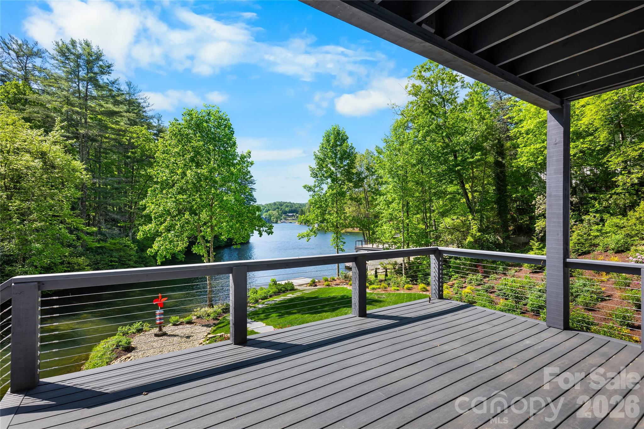 2235 Cold Mountain Road Lake Toxaway, NC 28747 - Photo 25 of 47 a view of deck with wooden floor and outdoor seating