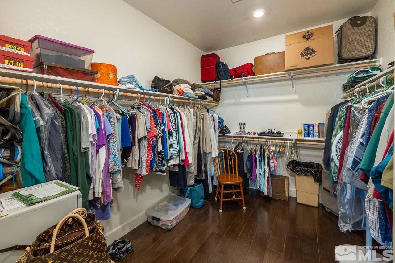 4501 High Pointe Drive Reno, NV 89521 - Photo 8 of 26 a view of walk in closet with clothes and shoes