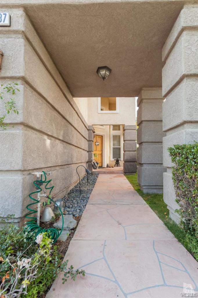 11137 Shadyridge Road Moorpark, CA 93021 - Photo 4 of 31 a view of a pathway with a house