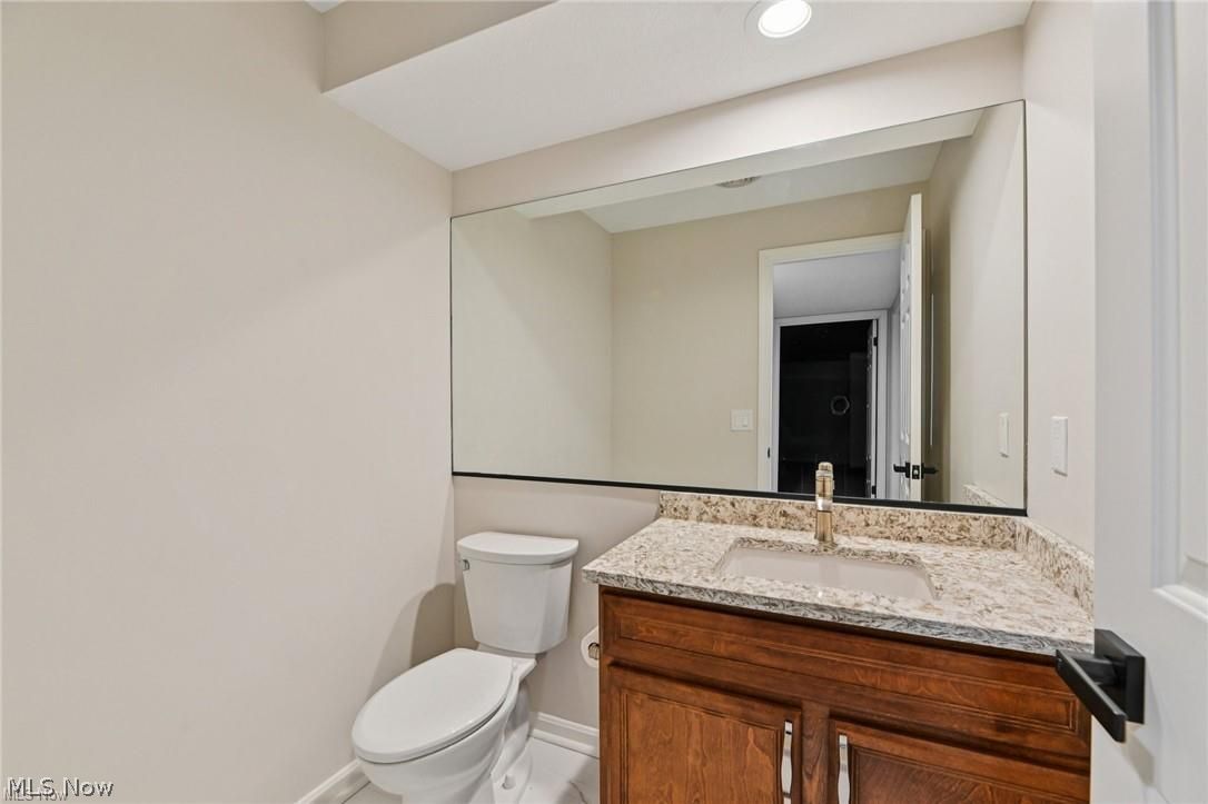 8215 Eagle Ridge Drive Painesville, OH 44077 - Photo 27 of 49 Lower Level powder room