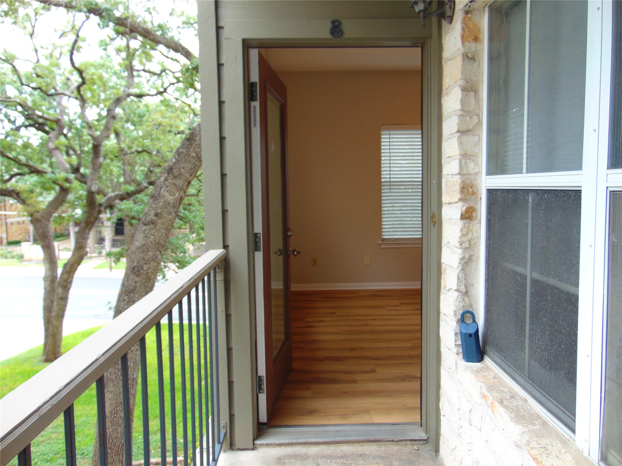 2508 Enfield Road, Unit 8 Austin, TX 78703 - Photo 5 of 16 a view of a balcony with a door