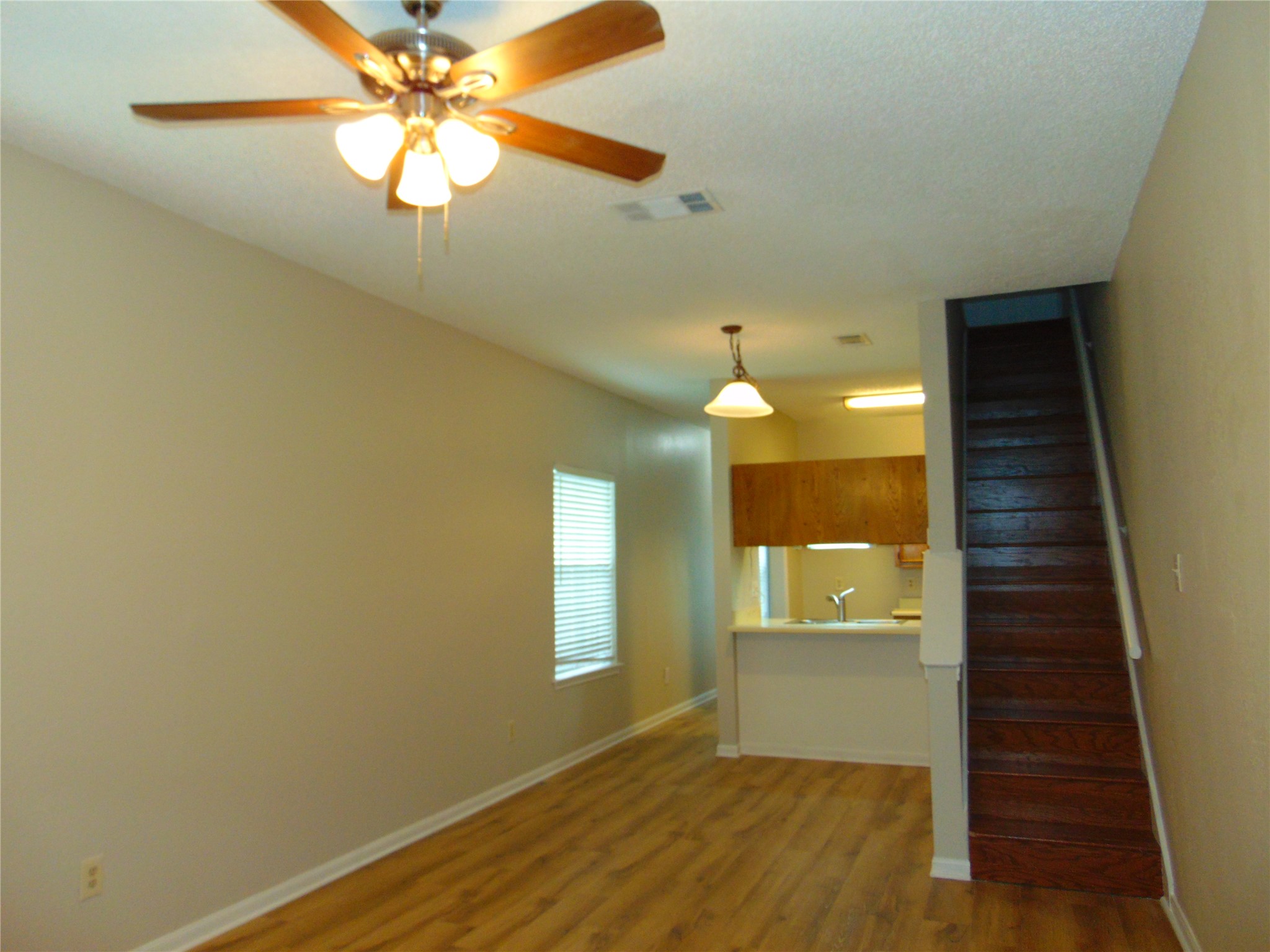 2508 Enfield Road, Unit 8 Austin, TX 78703 - Photo 7 of 16 a view of a hallway with wooden floor