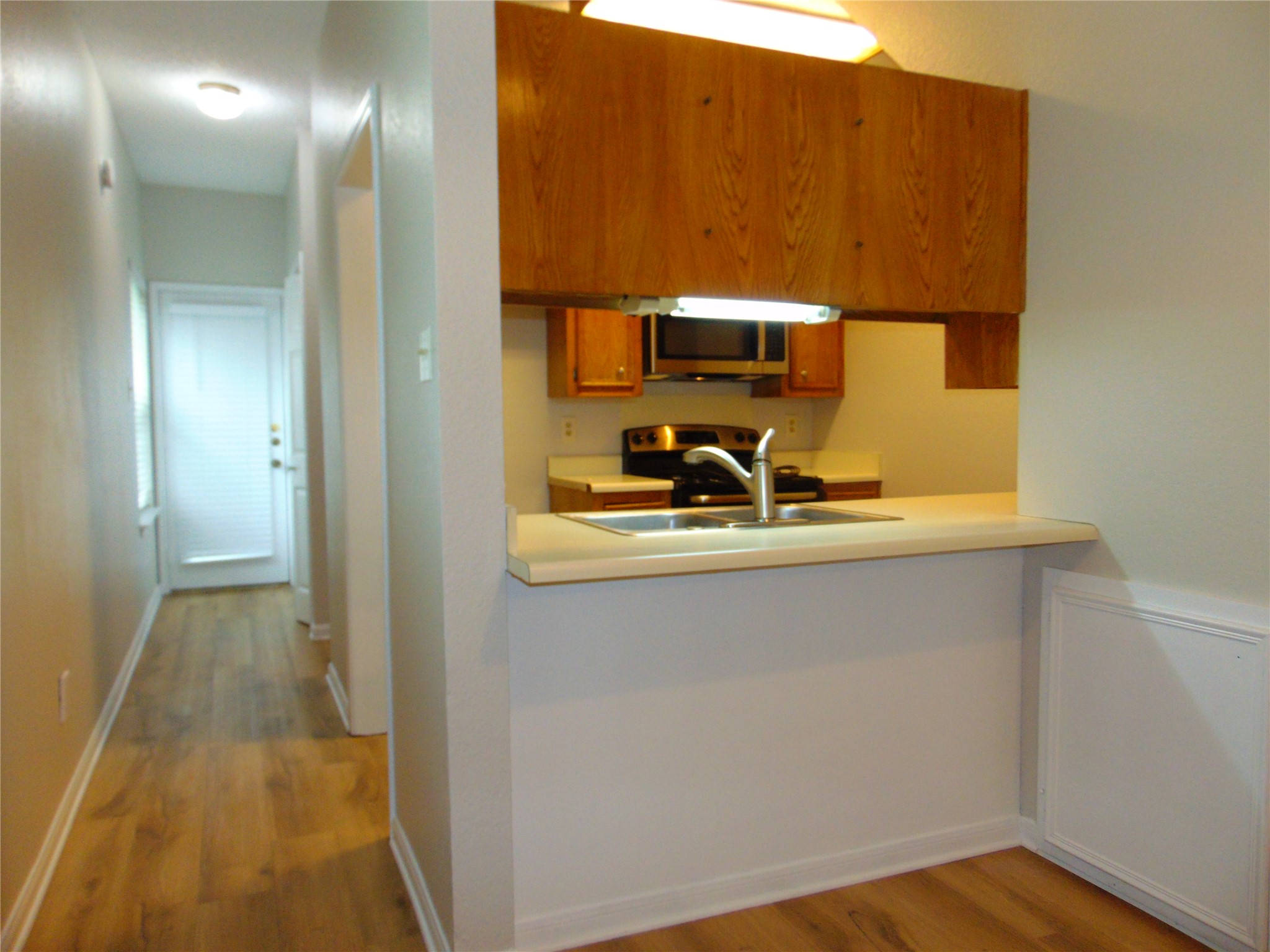 2508 Enfield Road, Unit 8 Austin, TX 78703 - Photo 8 of 16 a bathroom with a sink and a mirror