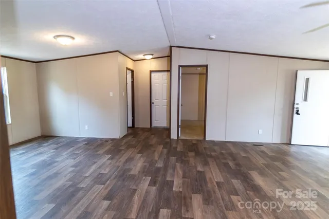 a kitchen with stainless steel appliances granite countertop a refrigerator sink and stove