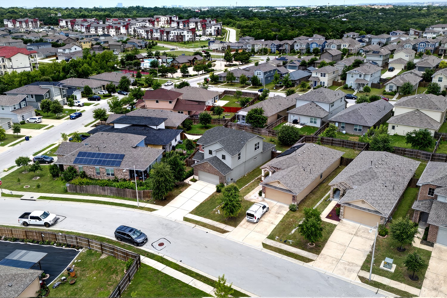 2006 Grow Lane Austin, TX 78754 - Photo 30 of 40 An aerial perspective reveals a modern residential neighborhood with a mix of housing styles and ample green space.