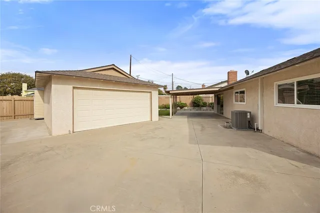 a front view of a house with a garage