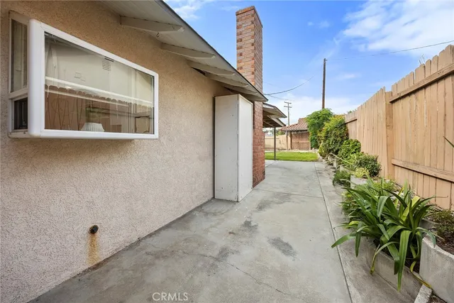 a view of a house with a flower plants