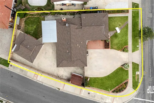 an aerial view of a house with swimming pool