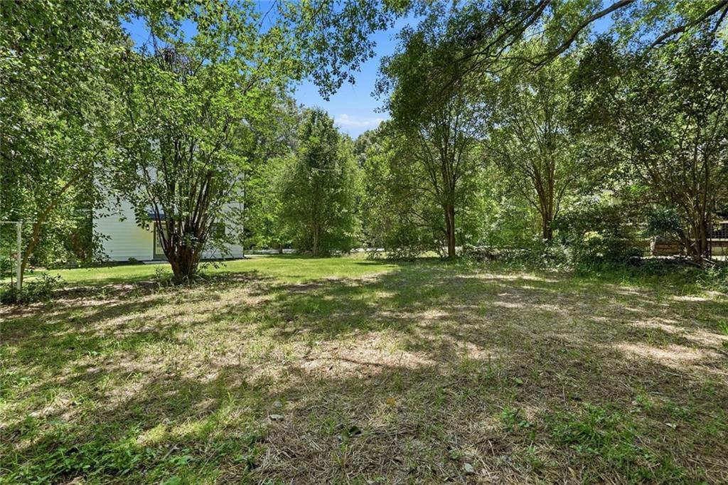 134 Henry Meyer Road Winterville, GA 30683 - Photo 30 of 34 a view of outdoor space with trees all around