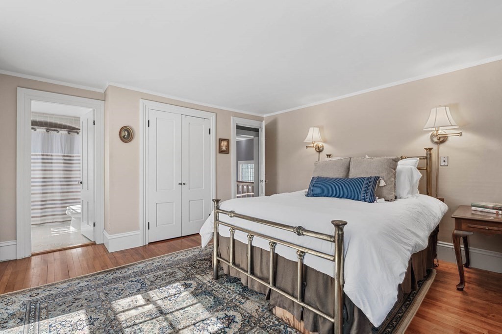 2 South Hampton Road Amesbury, MA 01913 - Photo 15 of 32 a bedroom with a bed and a window