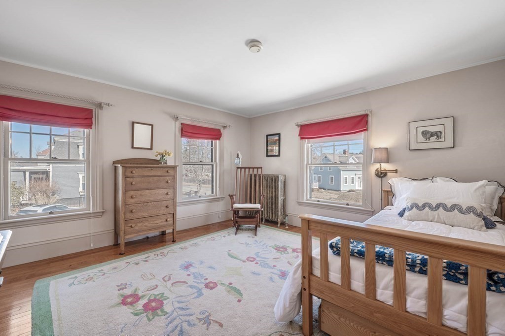 2 South Hampton Road Amesbury, MA 01913 - Photo 20 of 32 a bedroom with furniture and a window
