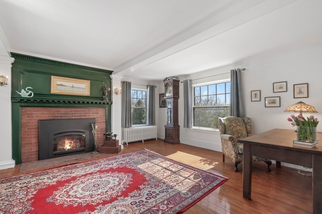 2 South Hampton Road Amesbury, MA 01913 - Photo 7 of 32 a living room with furniture and a fireplace