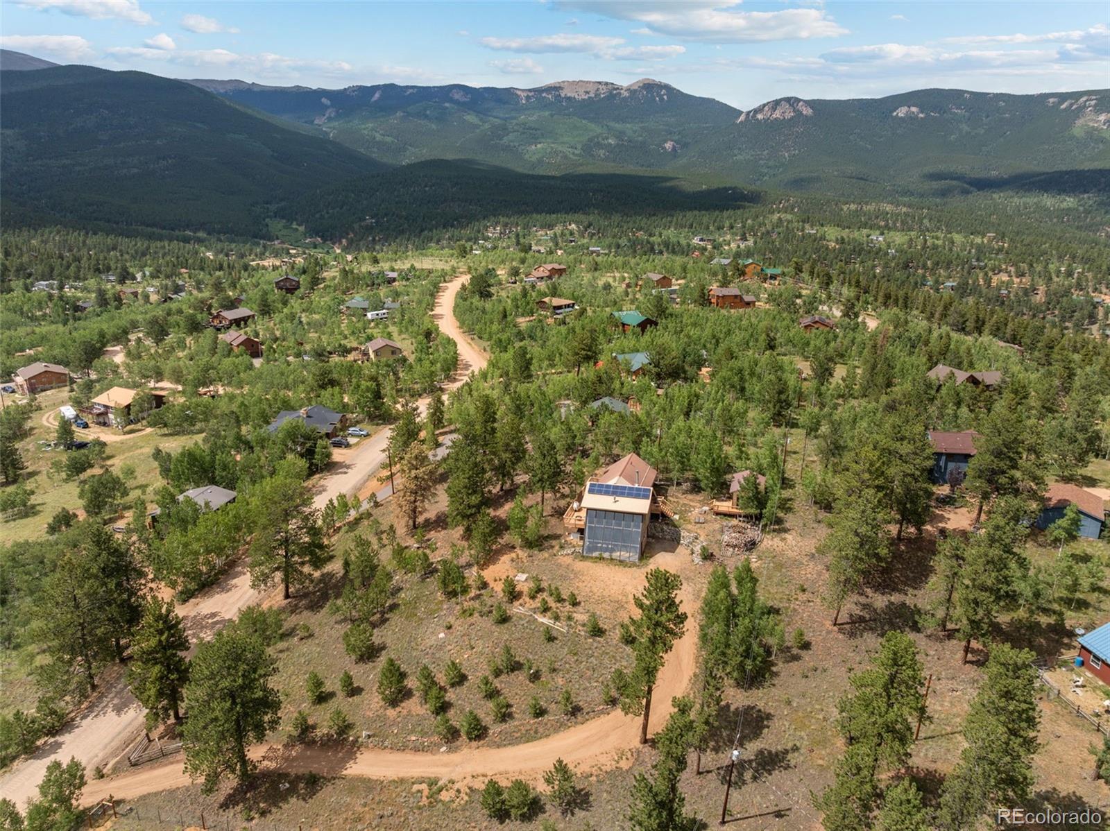 62 Quartz Circle Bailey, CO 80421 - Photo 2 of 38 a view of lake with mountain