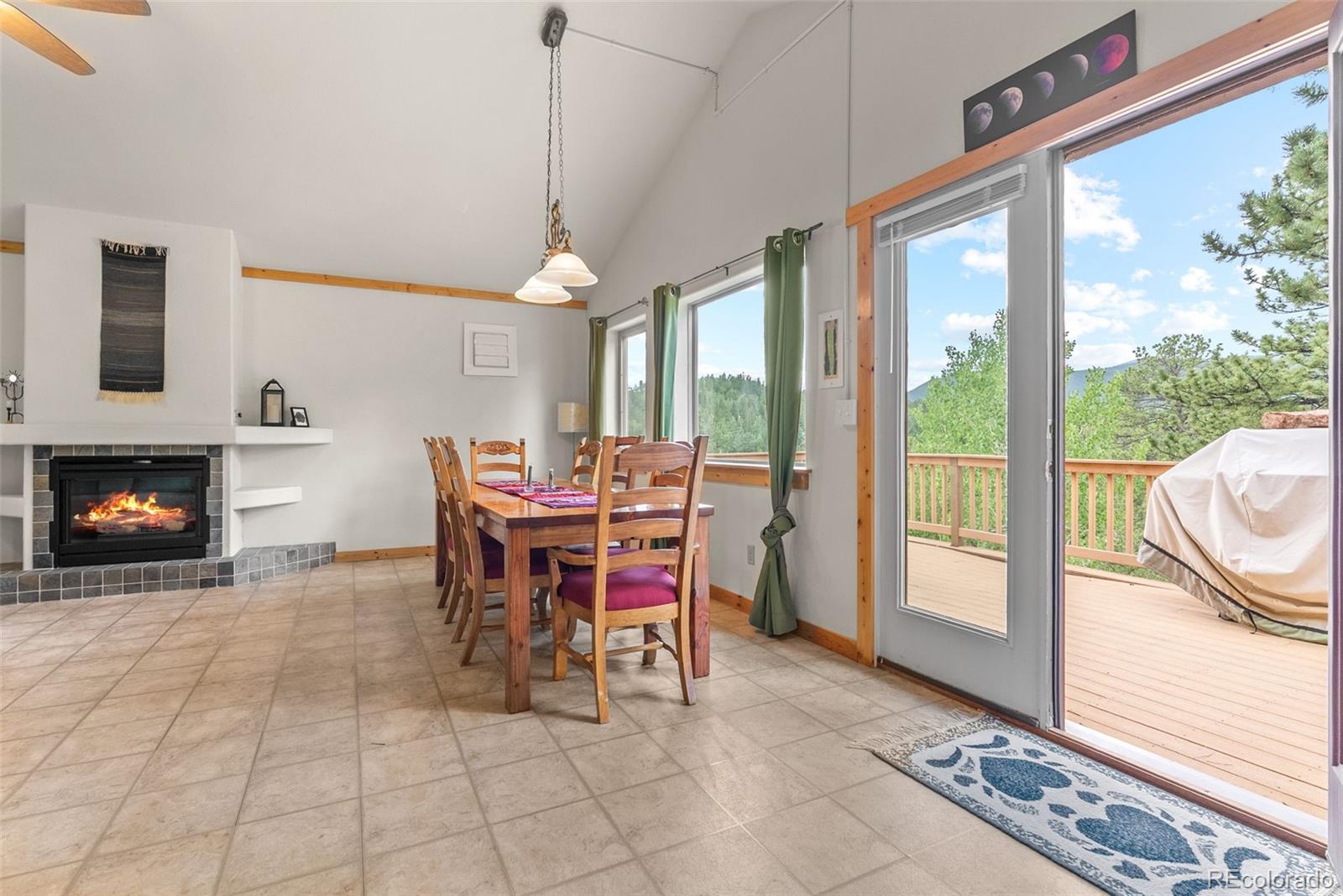 62 Quartz Circle Bailey, CO 80421 - Photo 22 of 38 a view of a dining room with furniture window and outside view