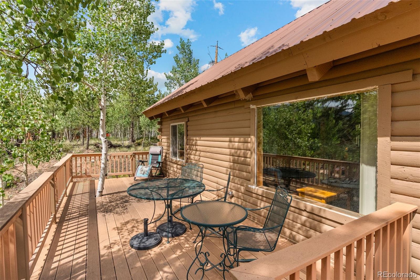 62 Quartz Circle Bailey, CO 80421 - Photo 26 of 38 a balcony with table and chairs