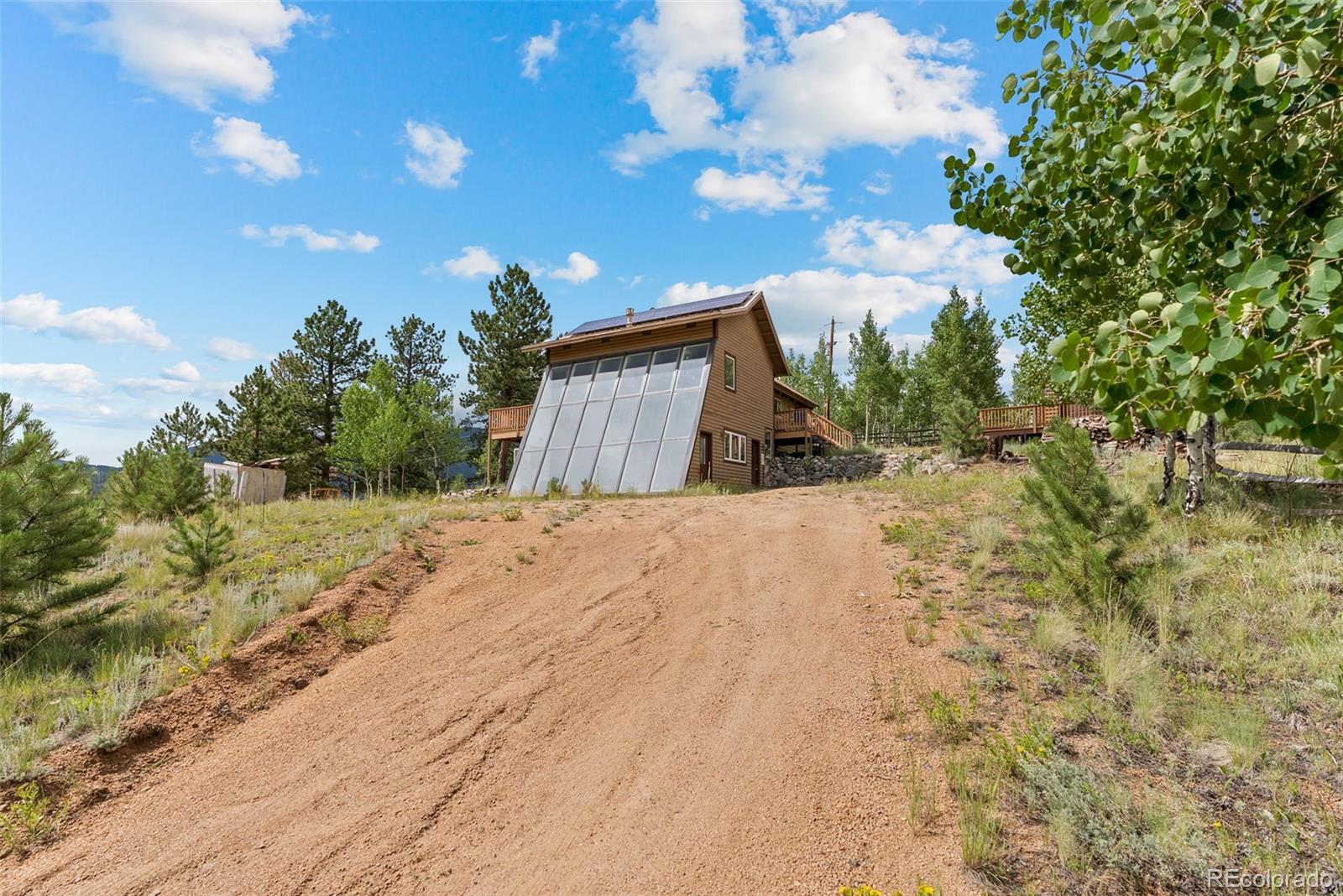 62 Quartz Circle Bailey, CO 80421 - Photo 33 of 38 a view of a backyard of the house