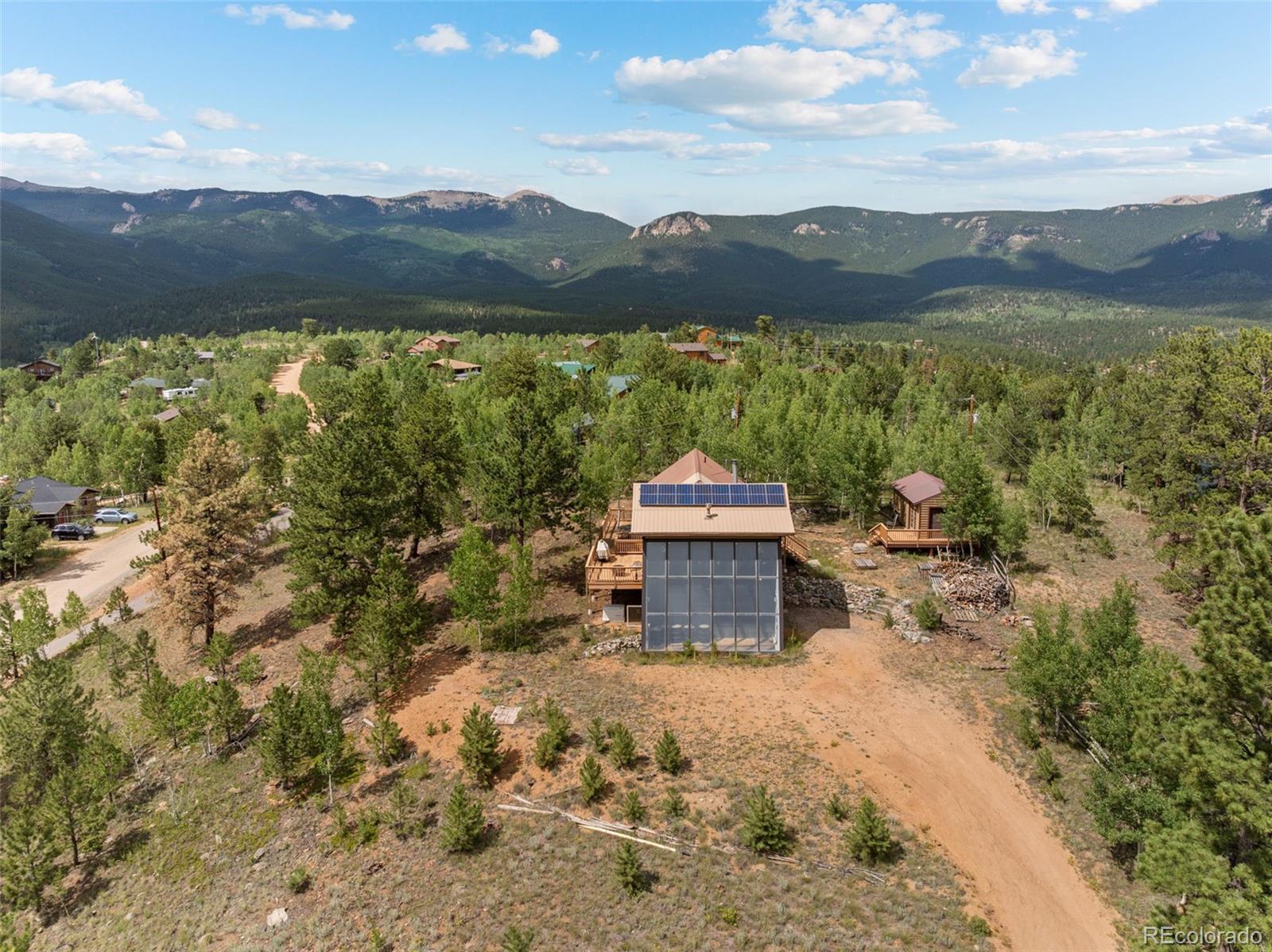 62 Quartz Circle Bailey, CO 80421 - Photo 34 of 38 a view of a lake with a mountain