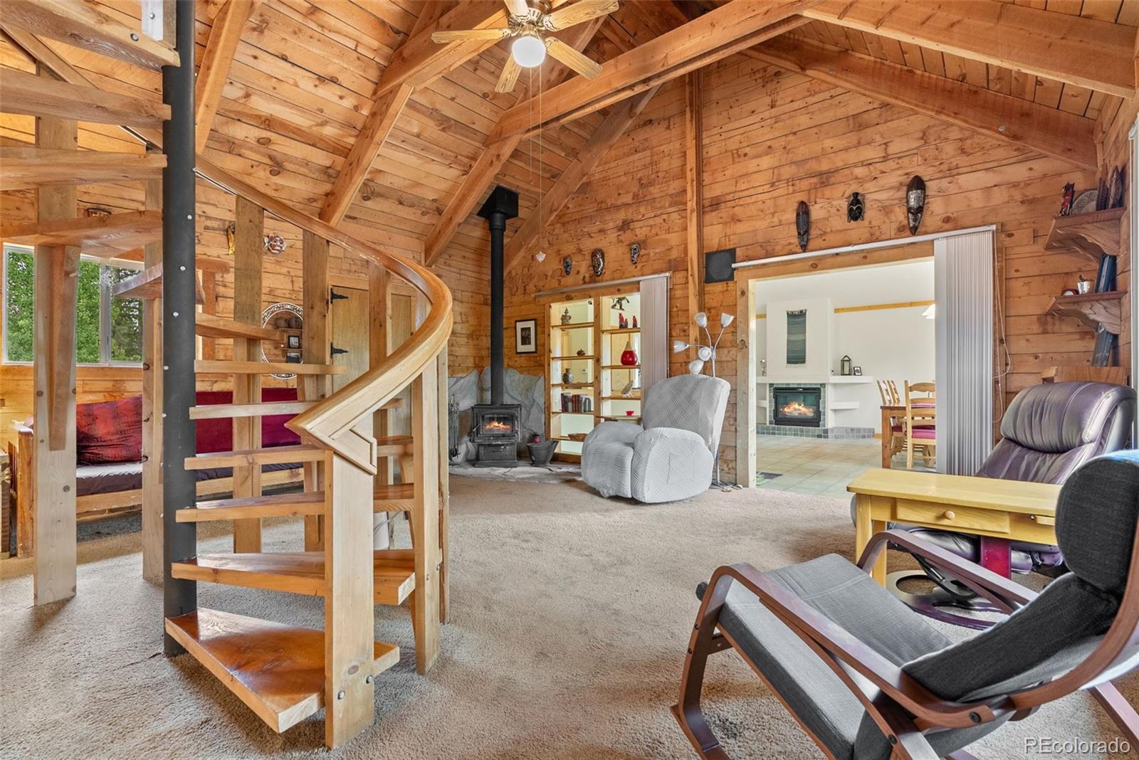 62 Quartz Circle Bailey, CO 80421 - Photo 8 of 38 a view of living room with stairs and furniture