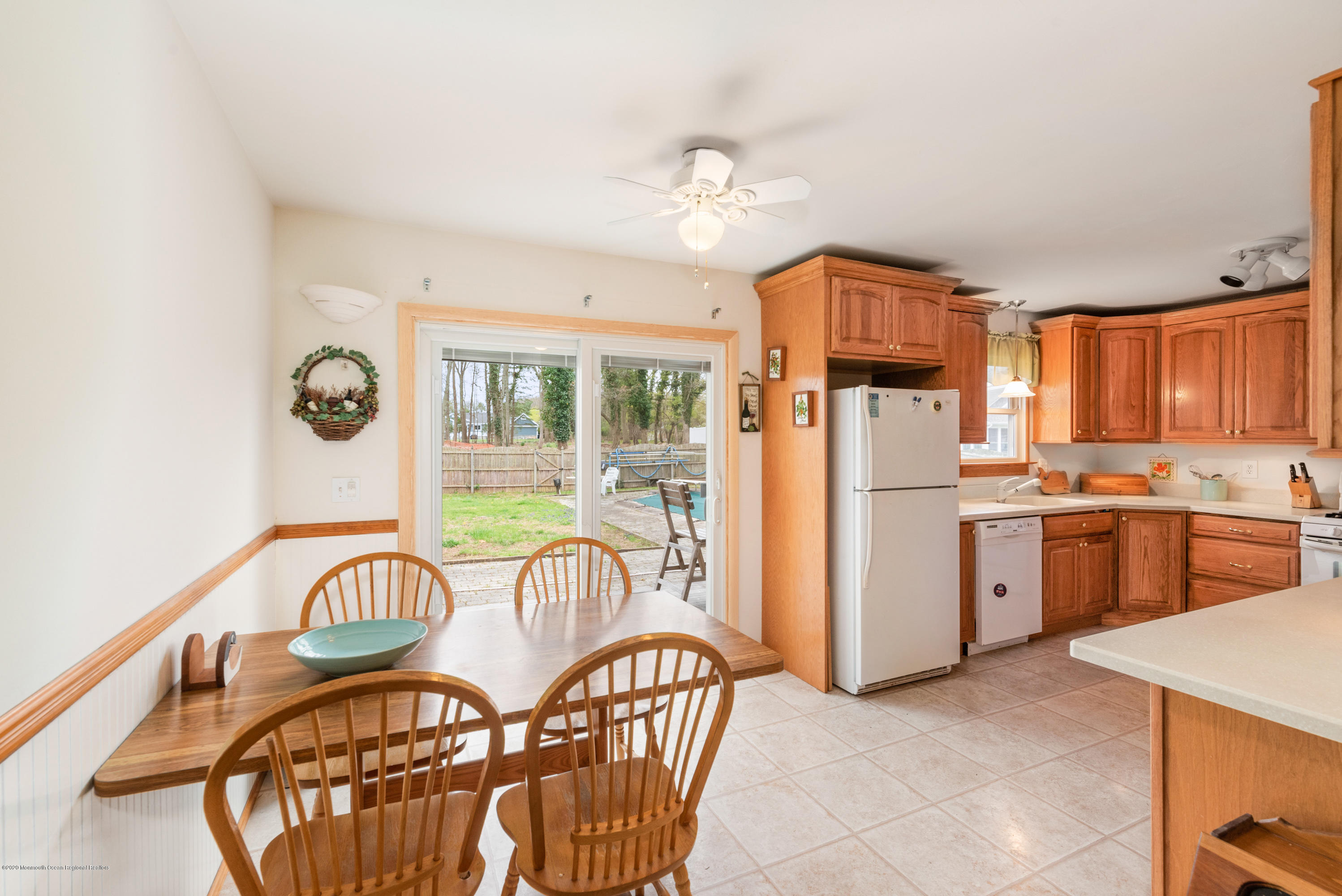 1313 Allaire Road Spring Lake, NJ 07762 - Photo 12 of 23 a open kitchen with stainless steel appliances granite countertop a dining table and chairs