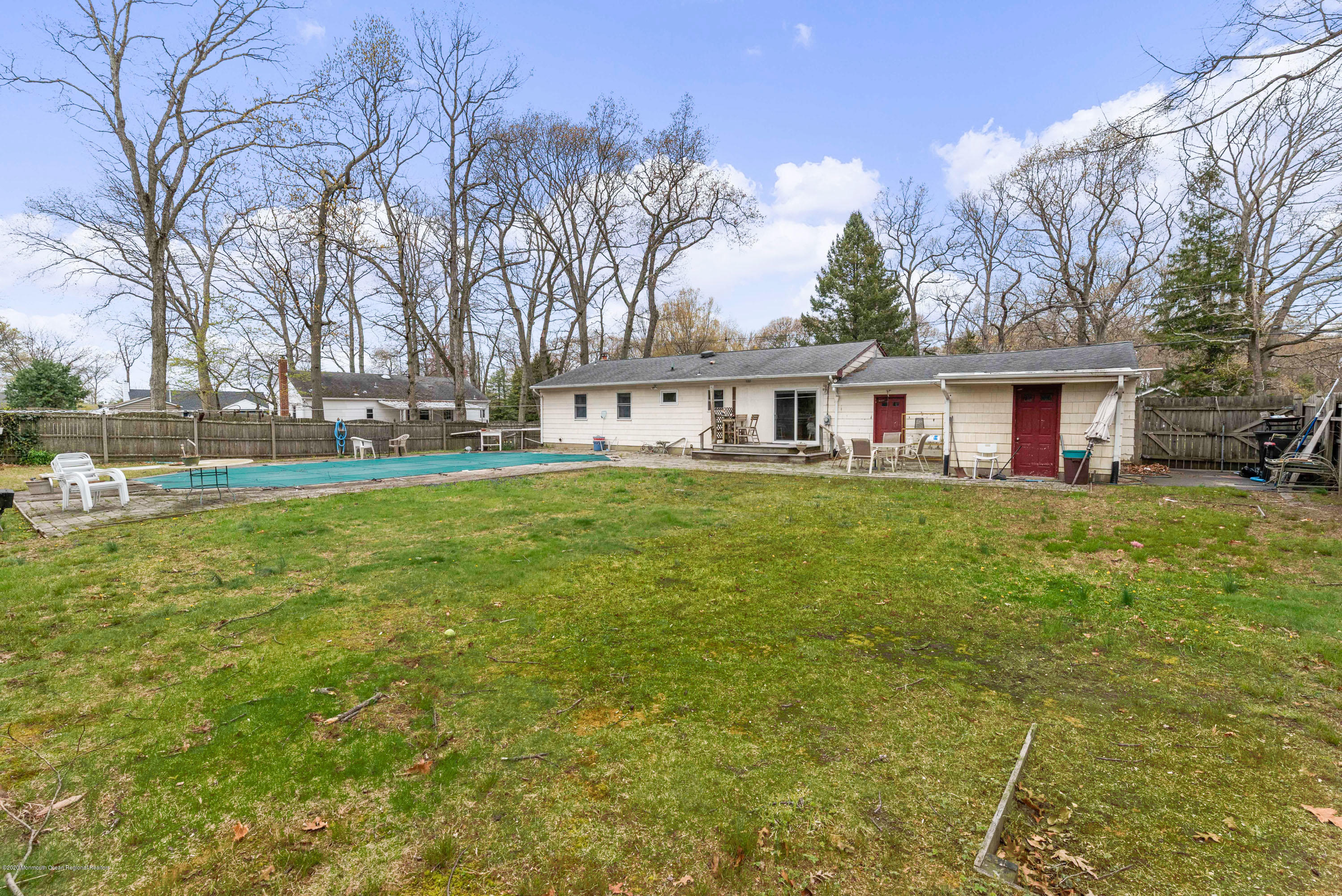 1313 Allaire Road Spring Lake, NJ 07762 - Photo 21 of 23 a view of a house with a big yard and large trees