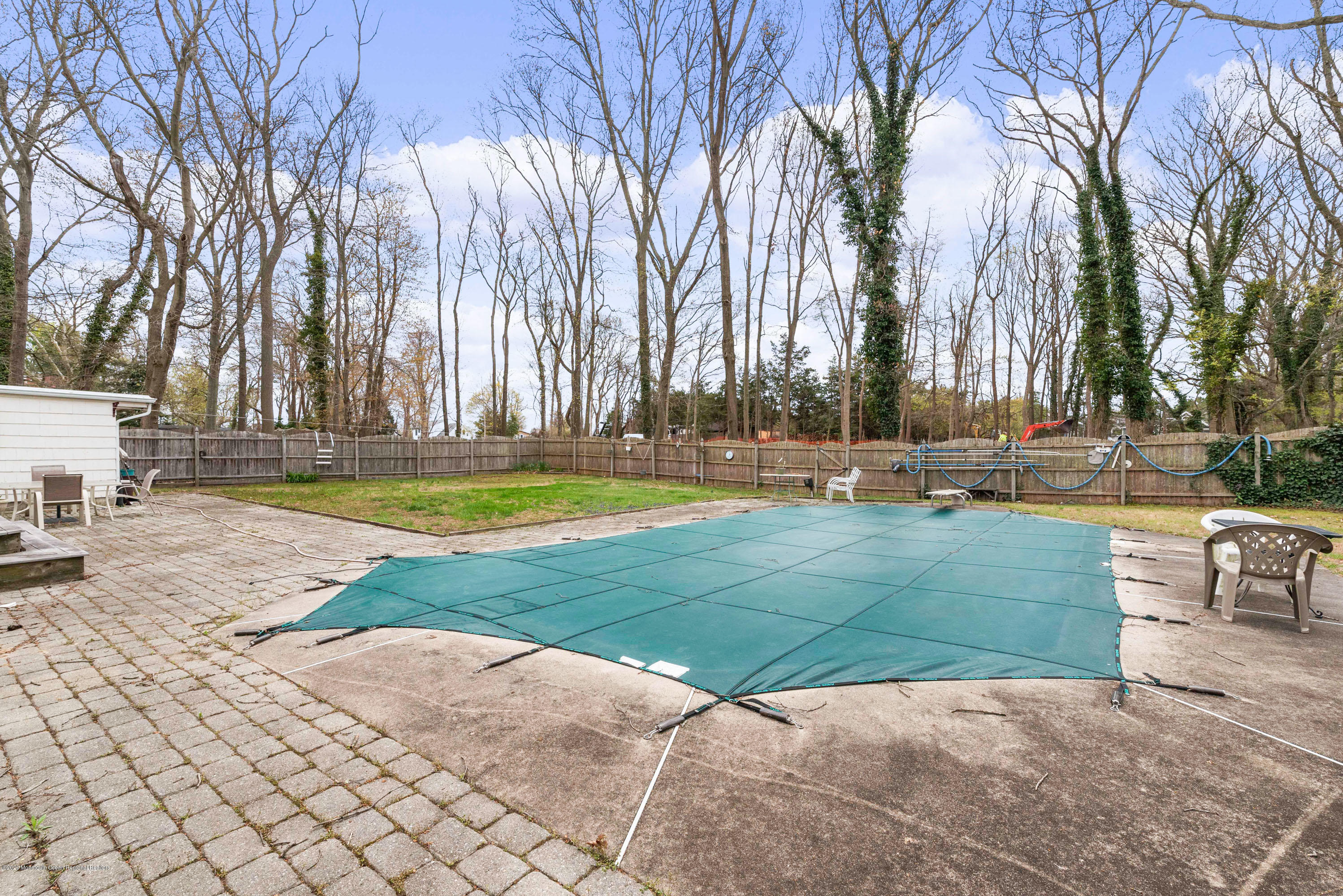 1313 Allaire Road Spring Lake, NJ 07762 - Photo 23 of 23 a view of a yard with swimming pool