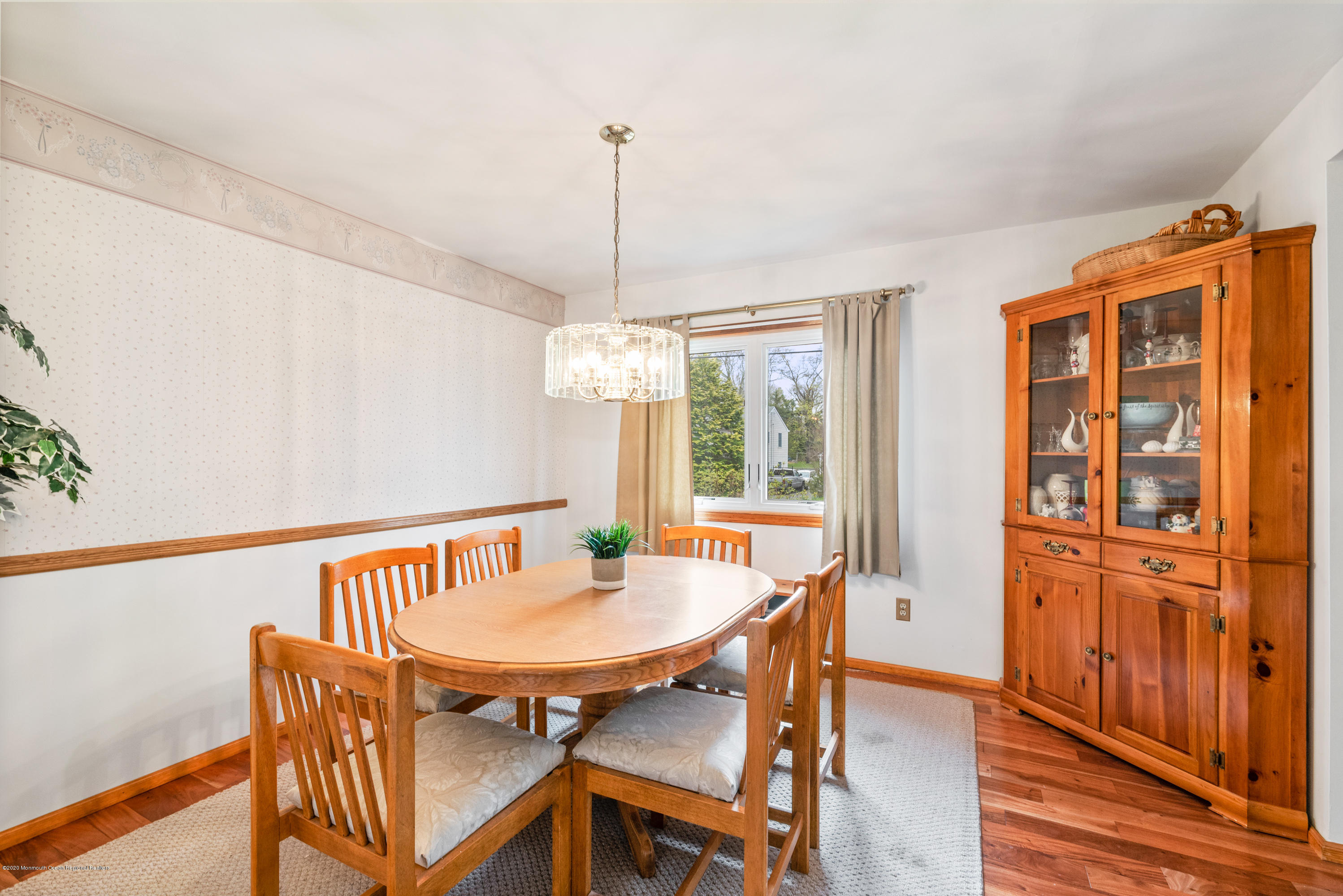 1313 Allaire Road Spring Lake, NJ 07762 - Photo 7 of 23 a view of a dining room with furniture window and wooden floor