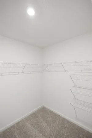 a picture of a bench in front of wall