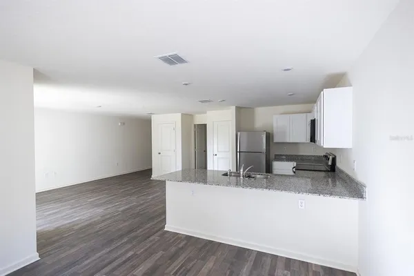 a view of living room with granite countertop furniture