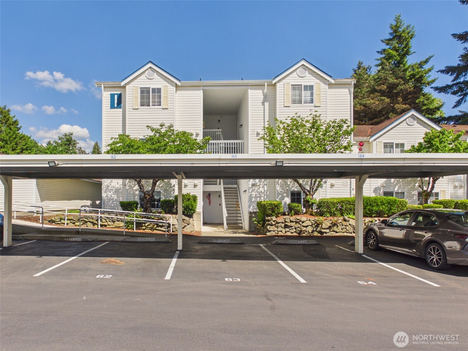 11002 Southeast Petrovitsky Road, Unit I102 Renton, WA 98055 - Photo 24 of 24 a view of a street with cars on city street
