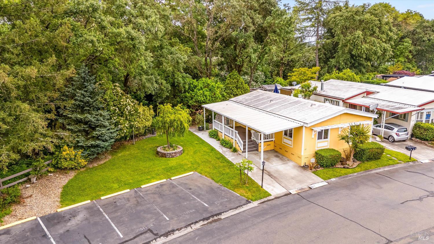 an aerial view of a house with a garden