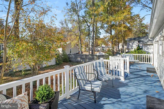 a view of a chair and table on the wooden floor