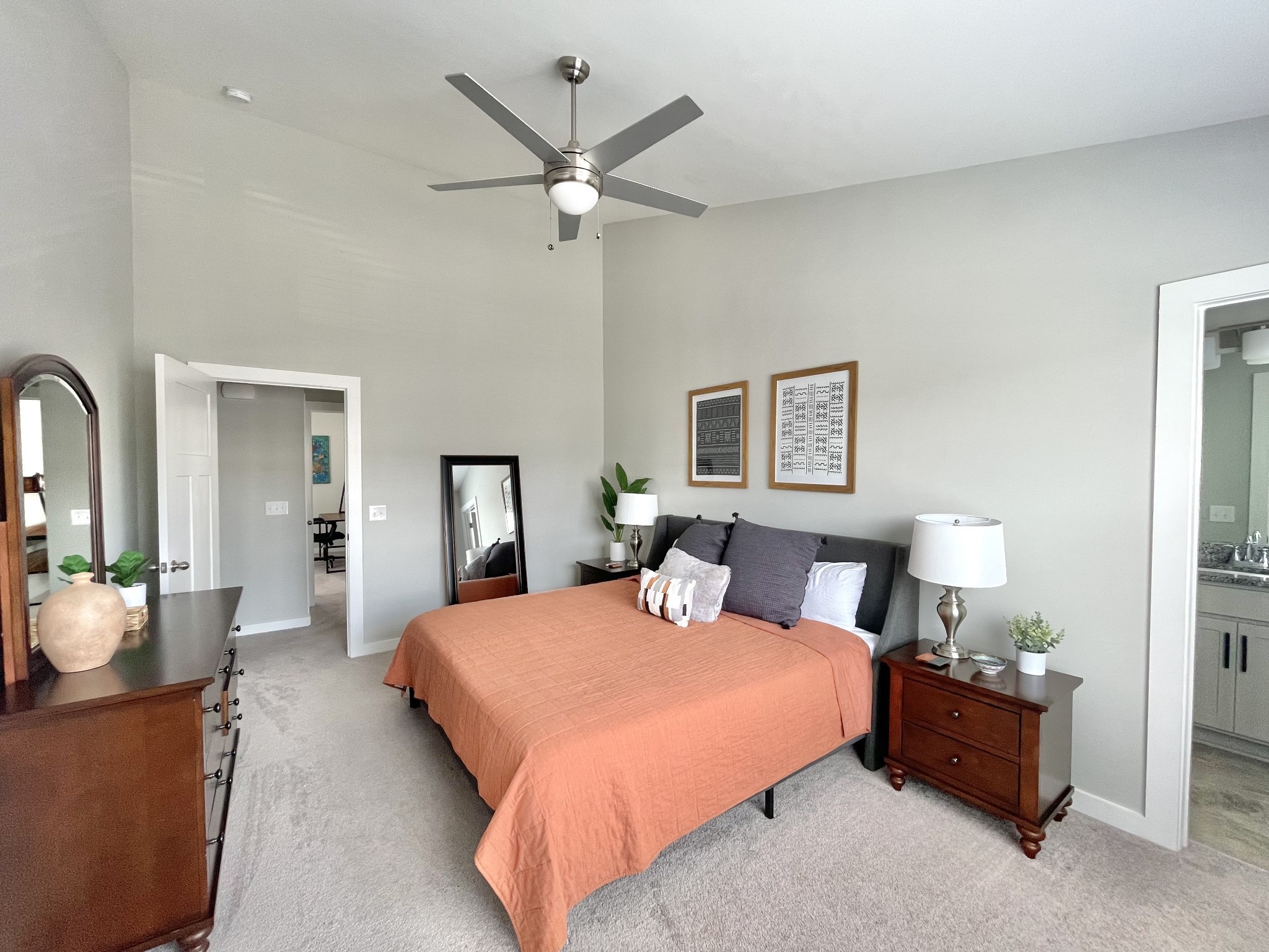 2327 Patrick Avenue Old Hickory, TN 37138 - Photo 18 of 36 a bedroom with a large bed and a chandelier