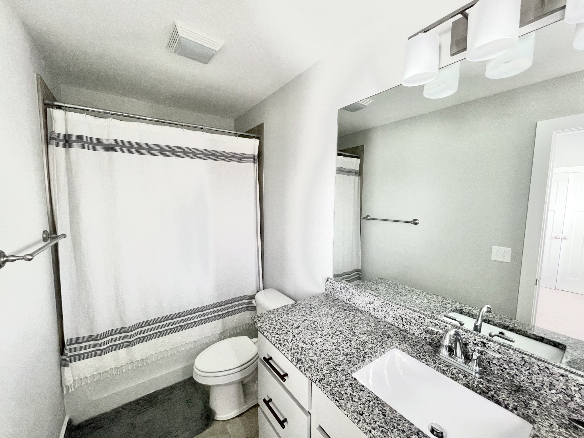 2327 Patrick Avenue Old Hickory, TN 37138 - Photo 19 of 36 a bathroom with a granite countertop sink toilet and shower