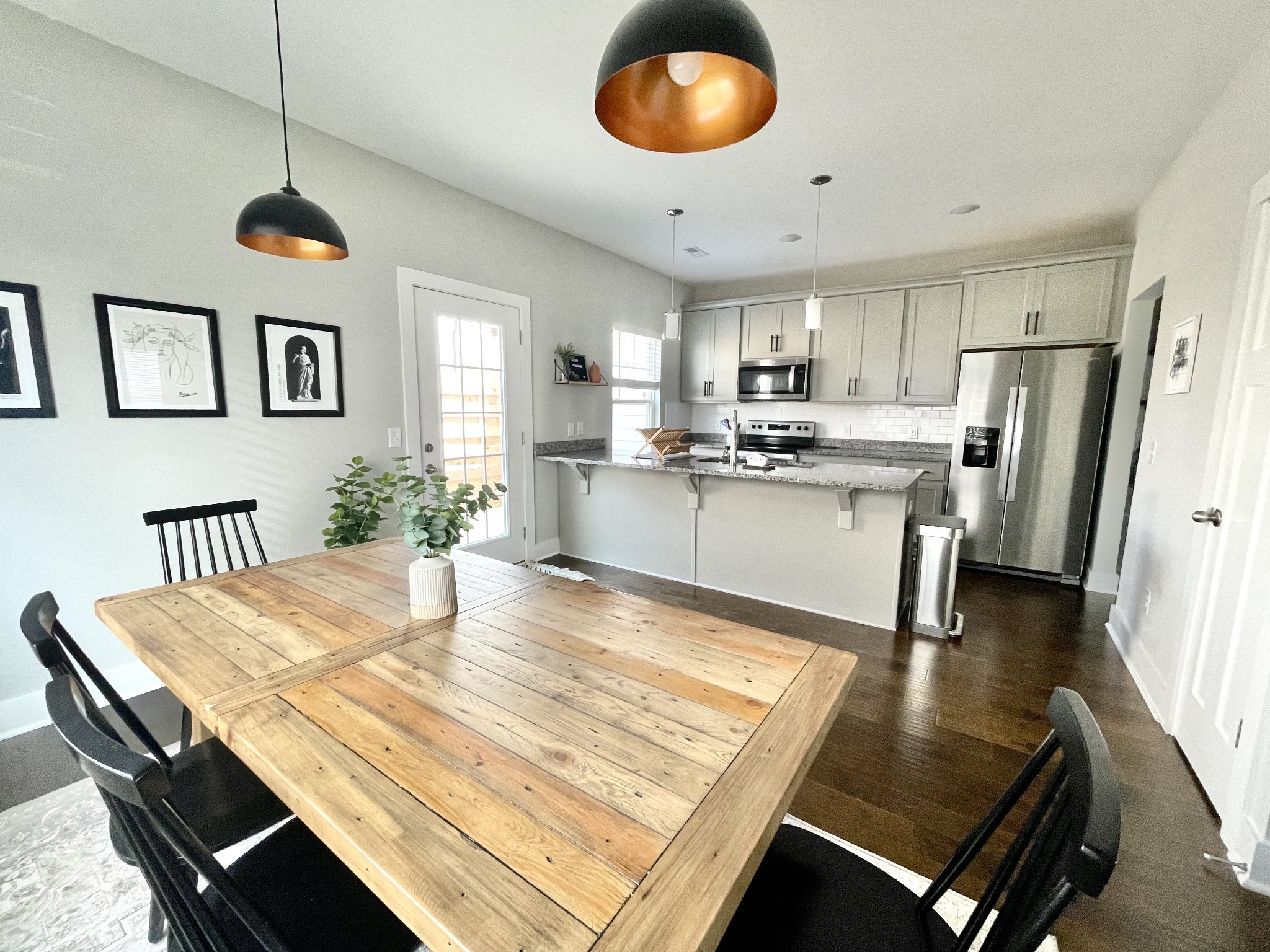 2327 Patrick Avenue Old Hickory, TN 37138 - Photo 7 of 36 a kitchen with stainless steel appliances granite countertop a stove refrigerator and cabinets