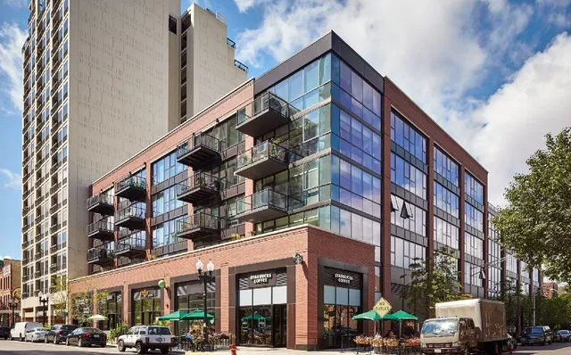 a view of a building with a street