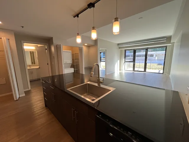 a room with lots of counter space and windows