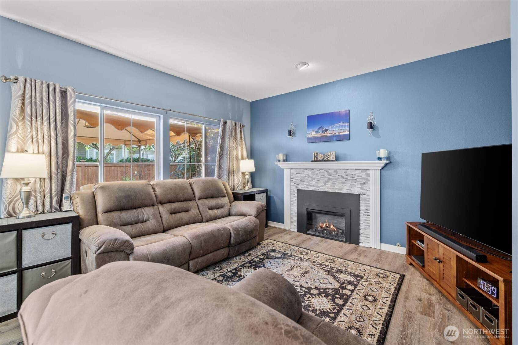 5021 South 232nd Street, Unit 75 Kent, WA 98032 - Photo 15 of 40 a living room with furniture fireplace and flat screen tv